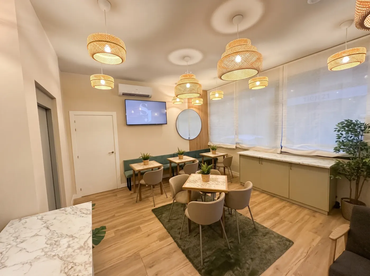 Breakfast room with wicker lamps and tiled tables